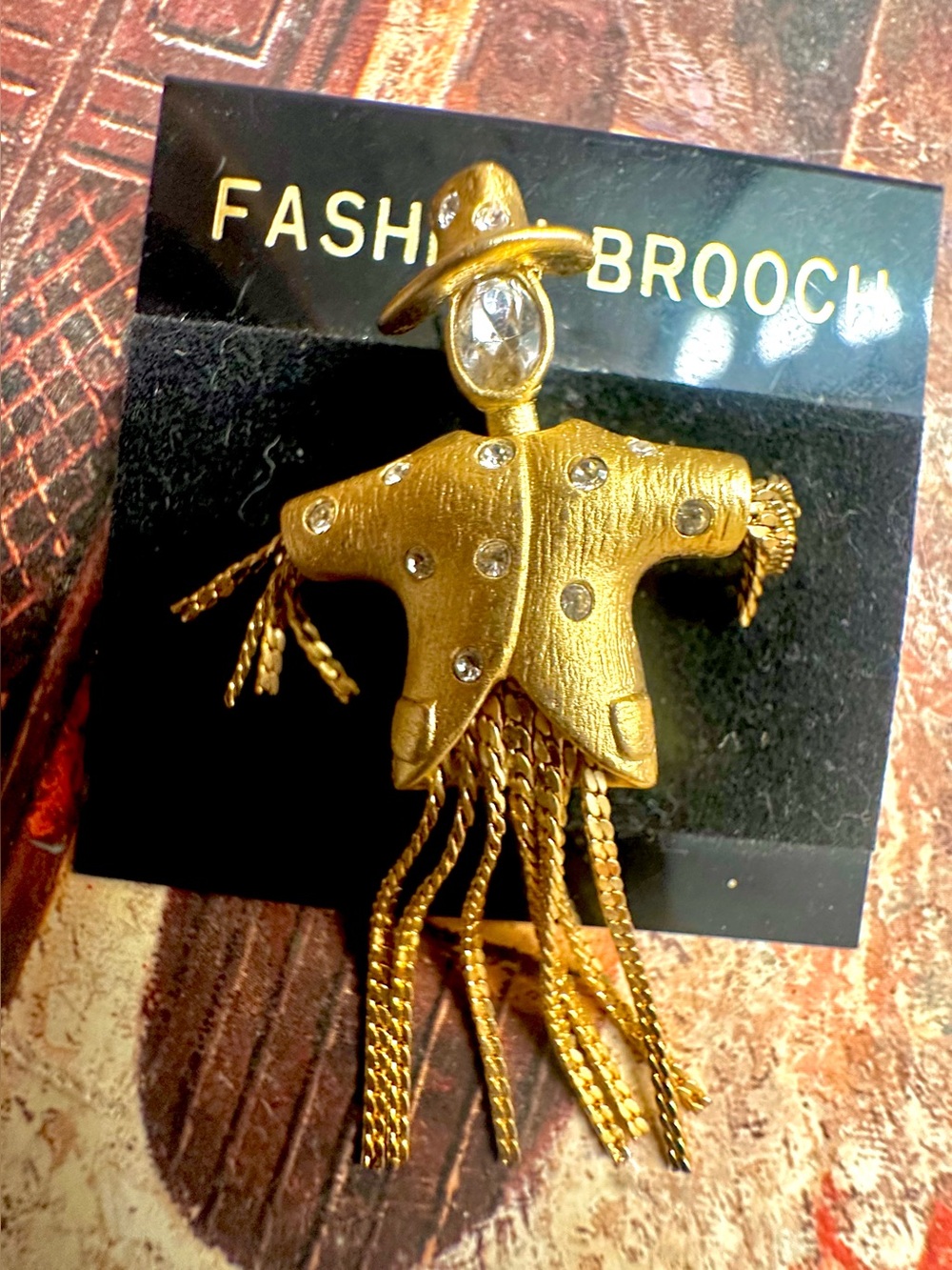 Gold Scarecrow Fringe Brooch with Rhinestone Detail by Pauline Rader